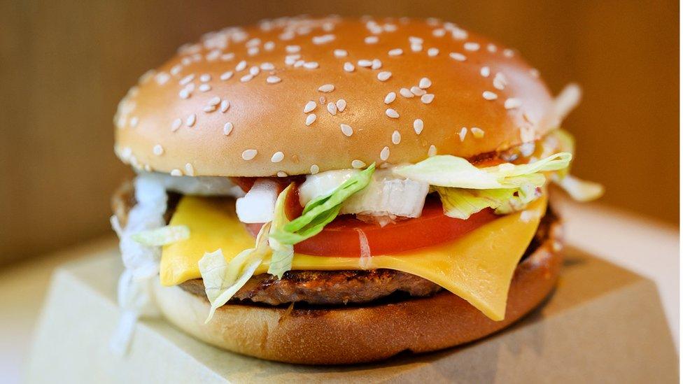 A McDonald's "PLT" burger with a Beyond Meat plant-based patty.