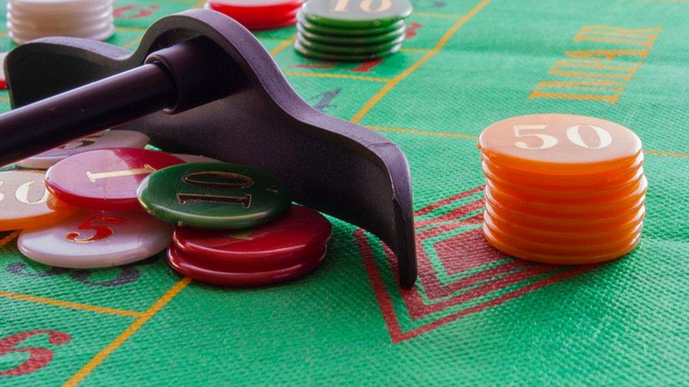 roulette game with game table and green poker chips