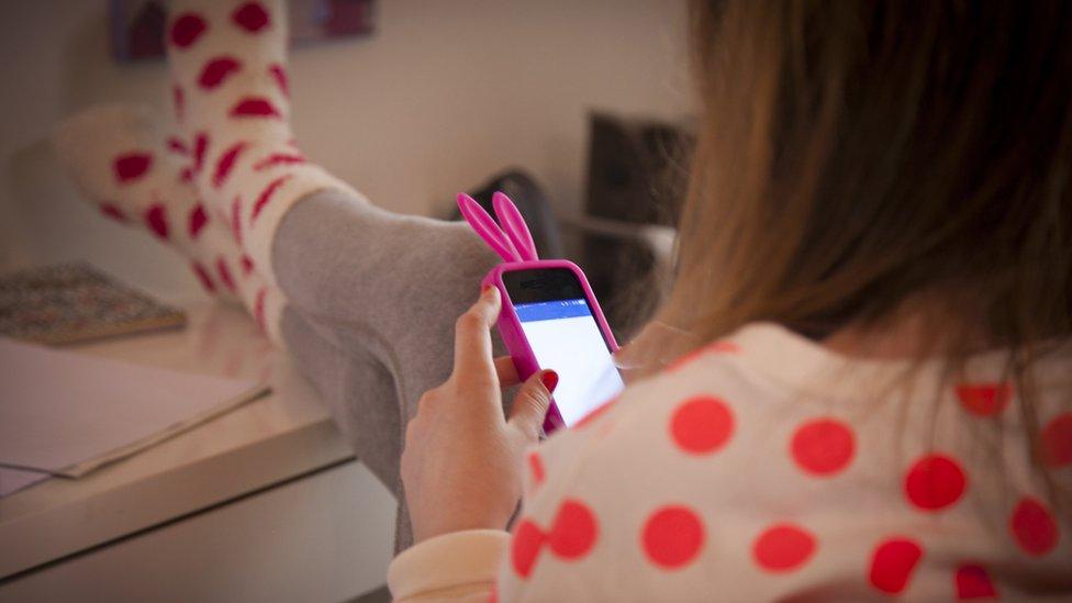 Girl playing on phone