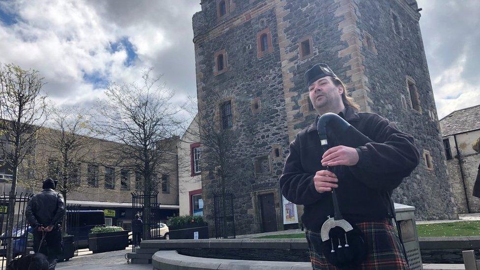 Man playing the bagpipes