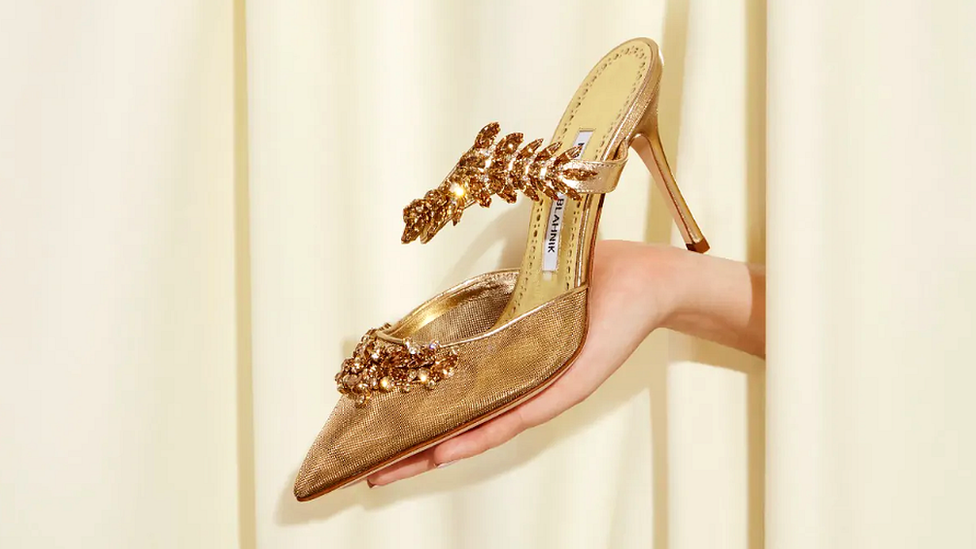 Gold Mesh Crystal Embellished Mules by Manolo Blahnik.