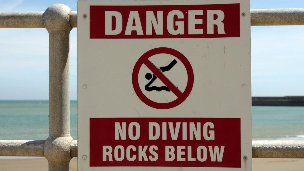 Danger swimming sign.