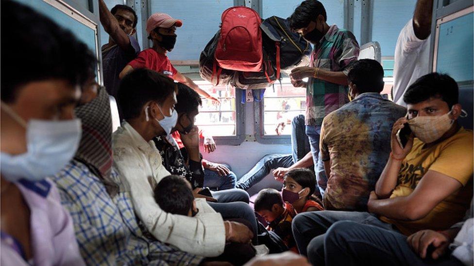 Migrants on board a train from Mumbai to Varanasi on April 9, 2021 in Mumbai, India.