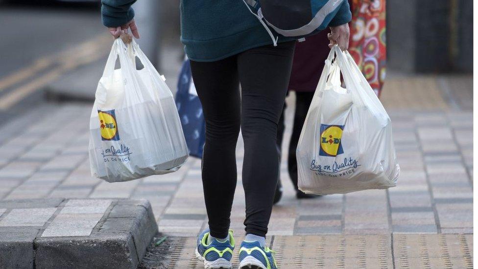 woman with Lidl bags