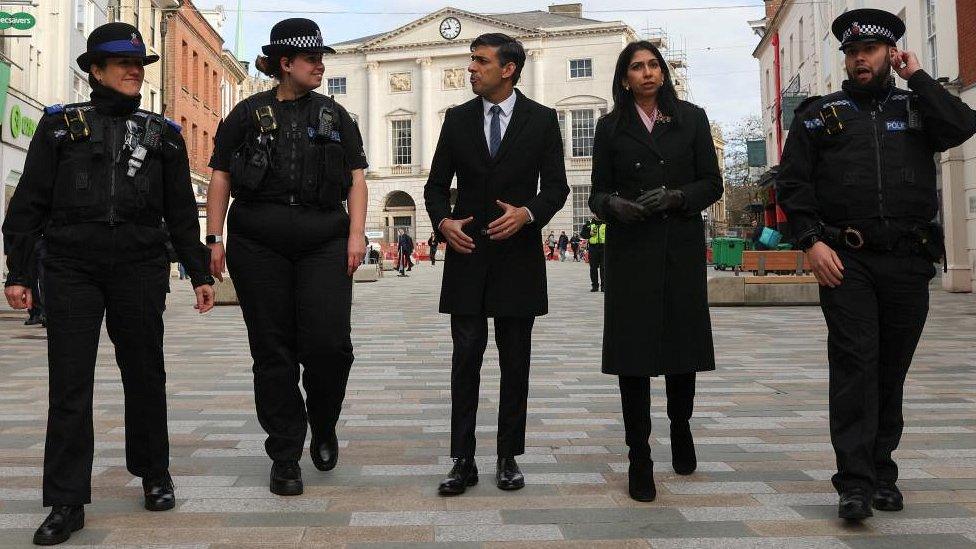 British Prime Minister Rishi Sunak visits Chelmsford, Britain March 27, 2023. Also present: Community Support Officer Sonja Viner, Police Sergeant Sophie Chesters, Home Secretary Suella Braverman and Police Sergeant Matt Collins.