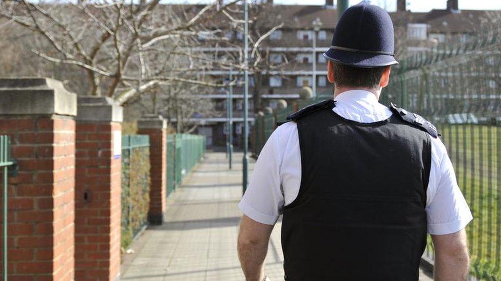 Metropolitan Police officer on patrol