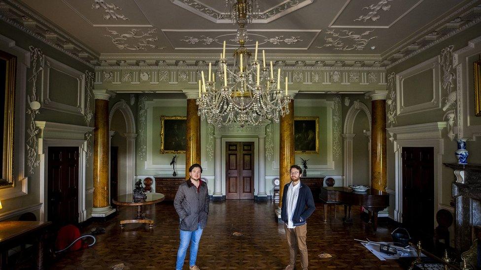 Neil Watt and Kris Reid under one of Castle Ward's chandeliers