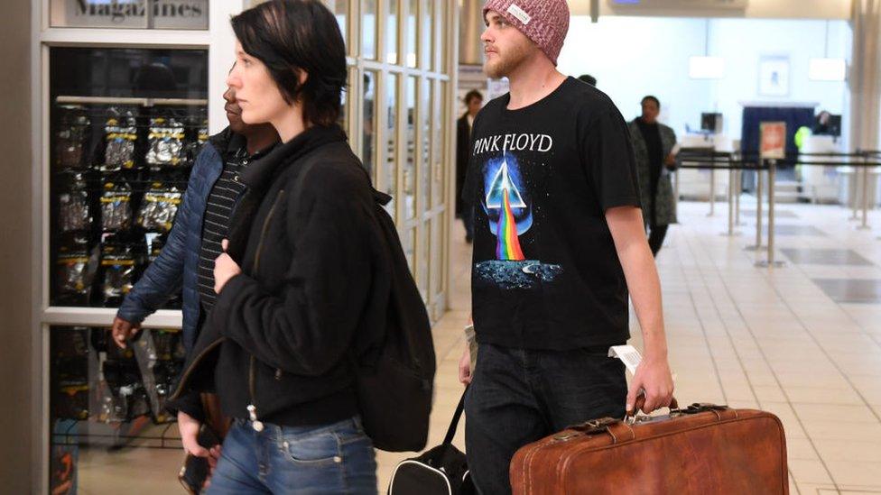 Murder accused Henri van Breda is seen with his girlfriend Danielle Janse van Rensburg at the Lanseria Airport on 15 May 2018 in Johannesburg, South Africa