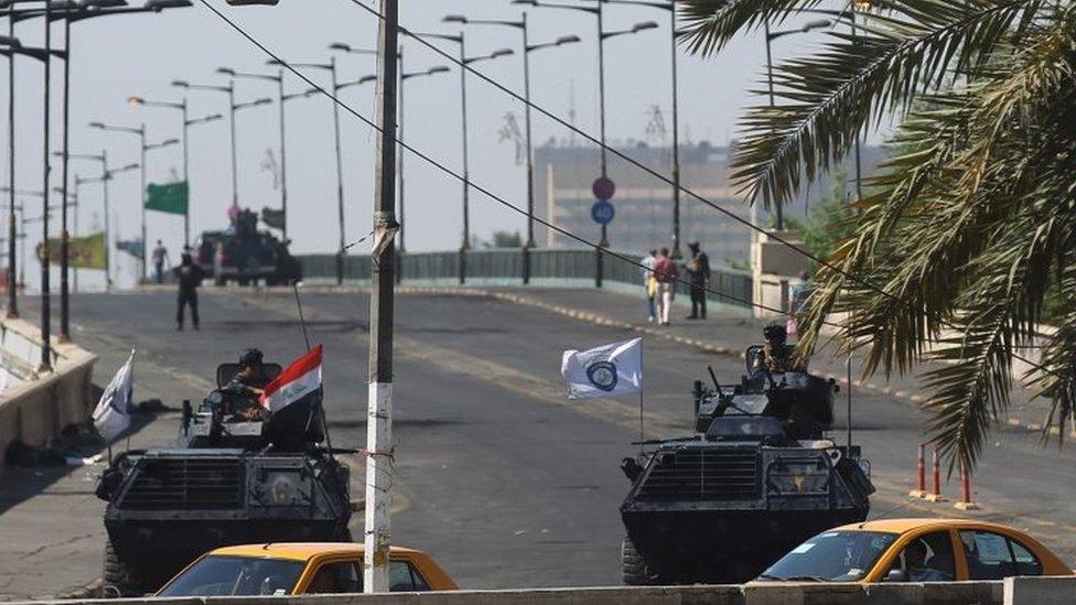 Iraq's security forces block a bridged in Baghdad. Photo: 5 October 2019