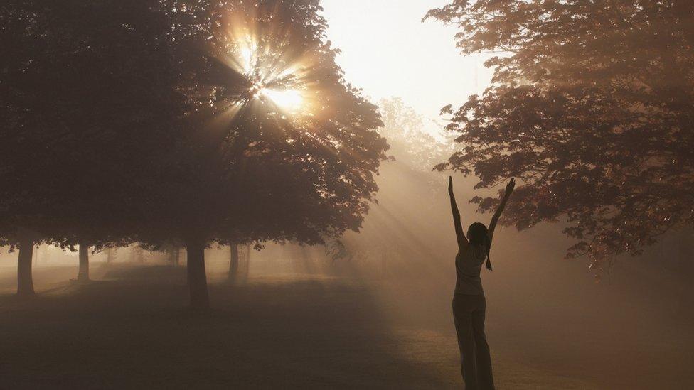 Woman exercising in the early morning