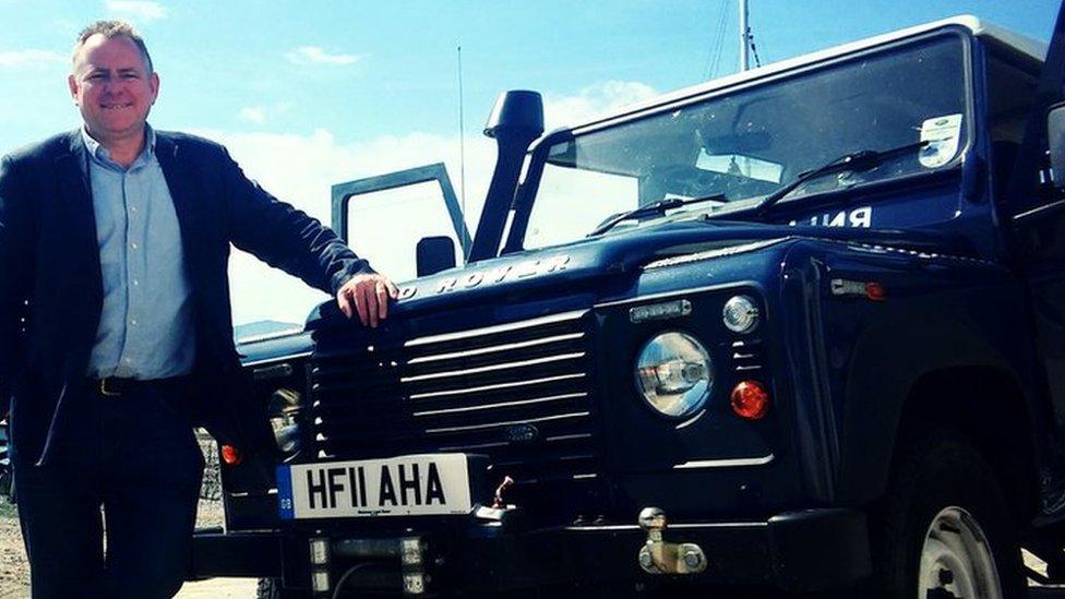 Jamie next to Land Rover