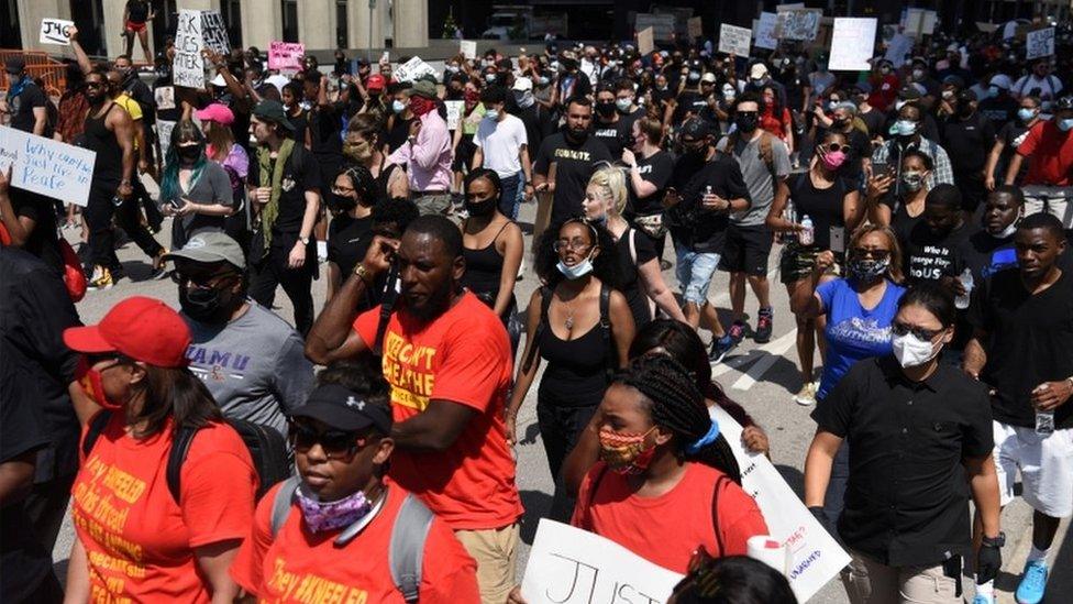 Some of the largest marches were in Houston, Texas - George Floyd's hometown. Protesters gathered at the City Hall and even stood in the water fountains holding signs saying "I can't breathe" and 'Justice for George'