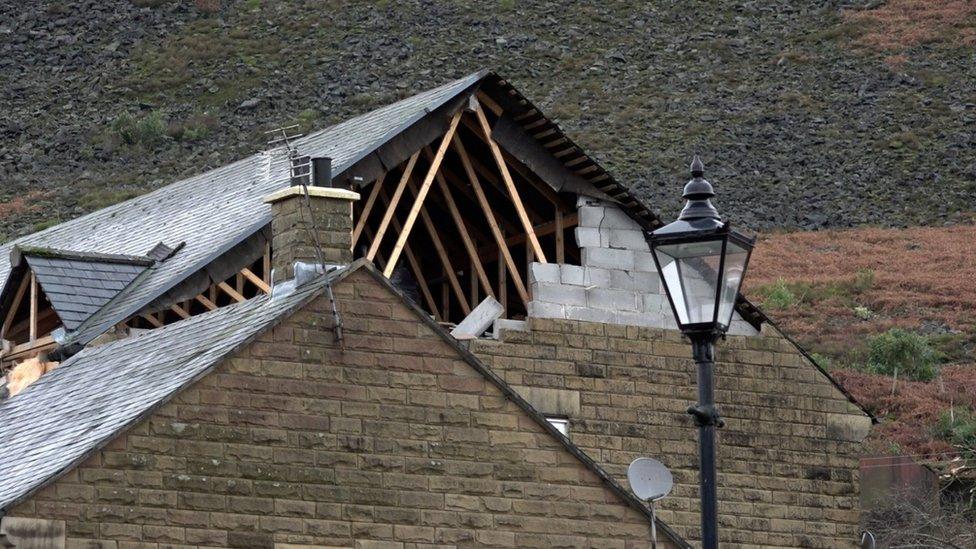 Screengrab taken from PA Video of a damaged roof in Stalybridge, following a "localised tornado" which damaged around 100 properties in Greater Manchester