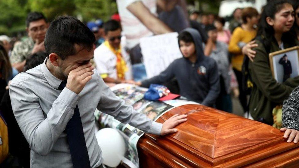 A relative reacts during the funeral of Andres Ponce, 38, who died during last week's series of protests against Chile's state economic model, in Santiago, Chile, October 27, 2019