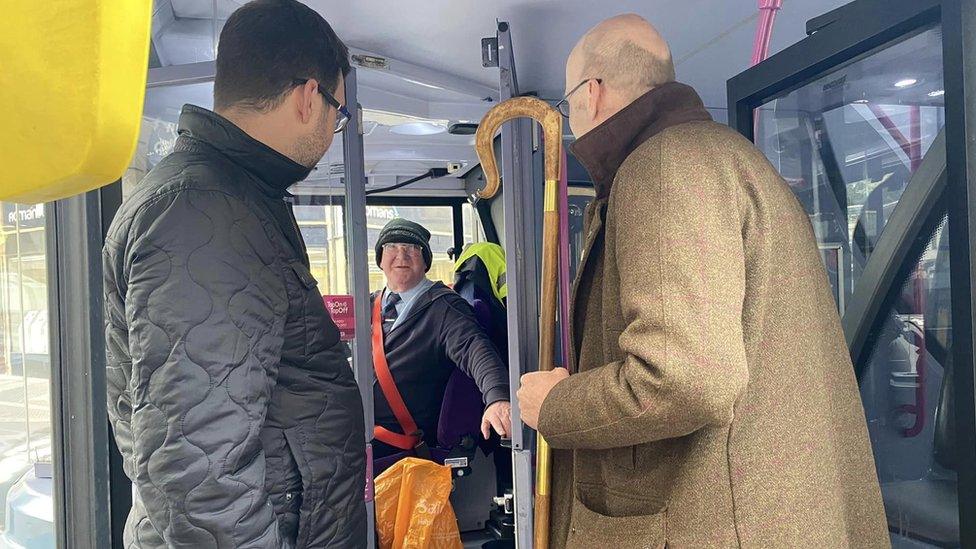 Michael Beasley boarding a bus