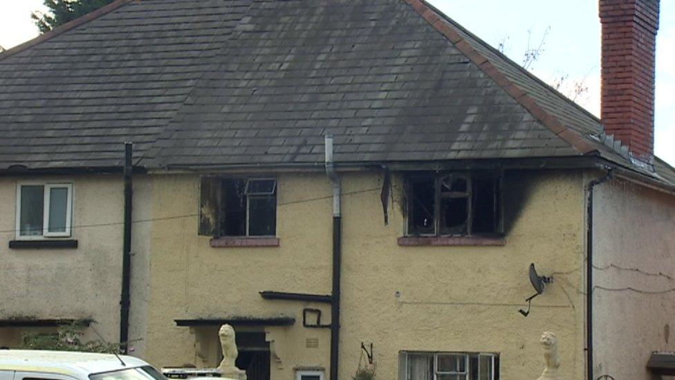 Photo of burnt-out house