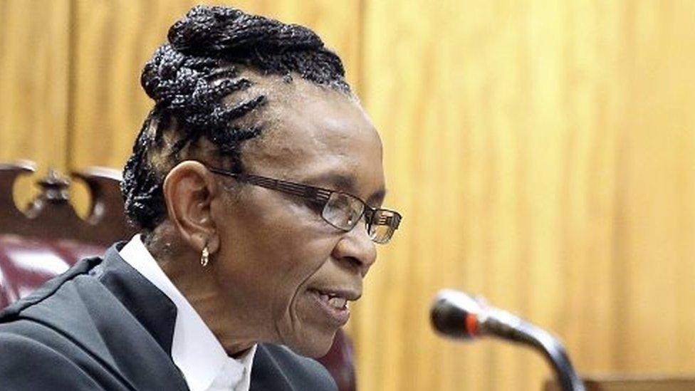 South African judge Thokozile Masipa delivers judgement during the appeal by prosecutors against the verdict and sentence of South African Paralympic athlete Oscar Pistorius in the North Gauteng High Court in Pretoria, on December 10, 2014