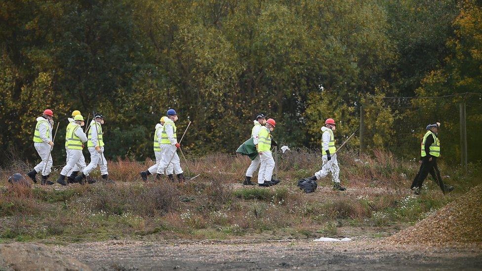 Police searching the site near Cambridge