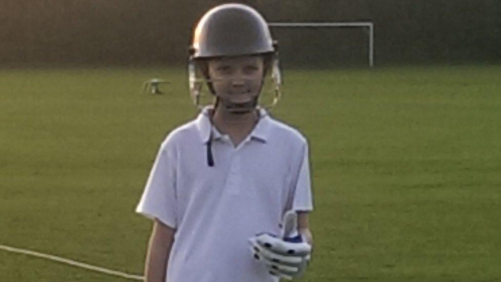 Leo playing cricket