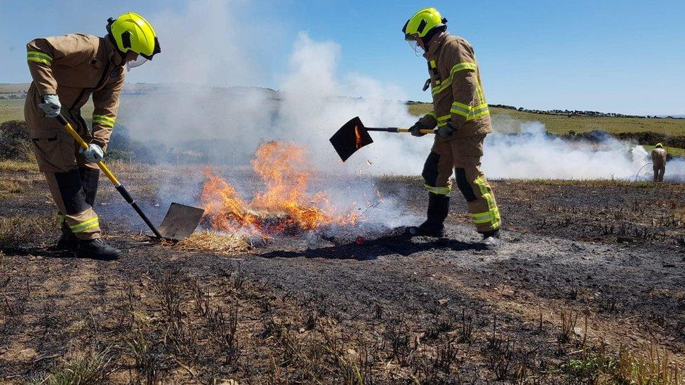 A fire crew tackling to fire