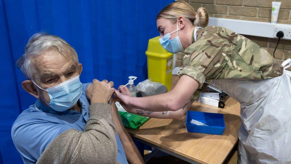 Man being vaccinated