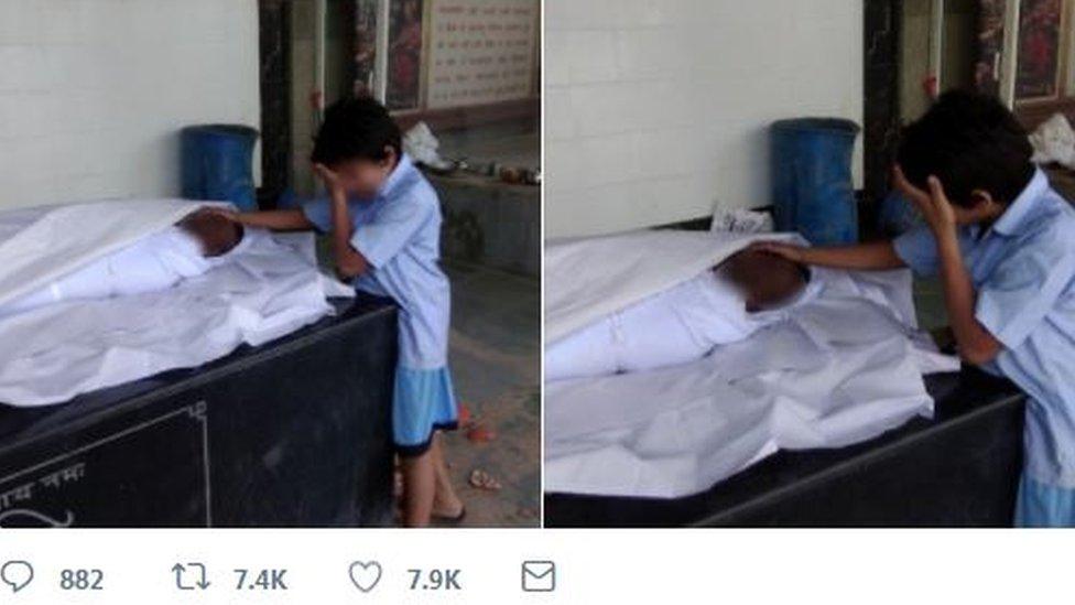 This photo of the worker's 11-year-old son sobbing next to his body went viral.