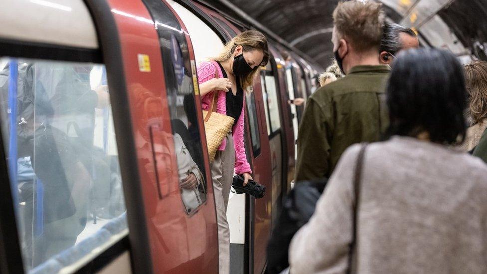 Tube passengers - some in masks