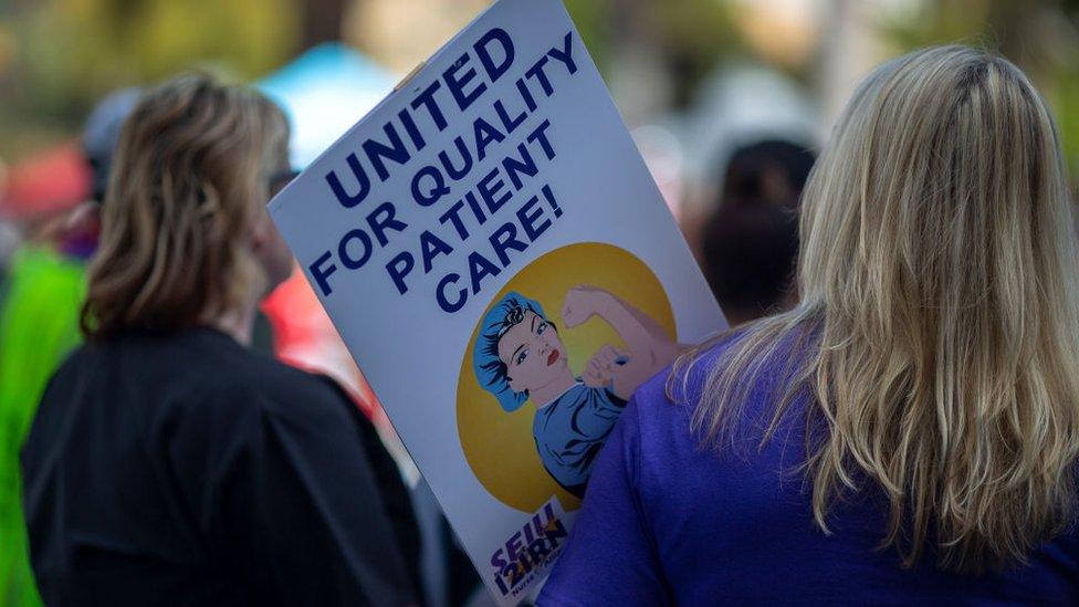 California workers march for immigrant healthcare coverage in May 2019