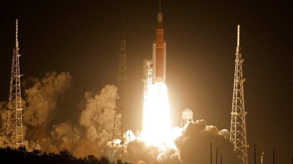 NASA's next-generation moon rocket, the Space Launch System (SLS) rocket with the Orion crew capsule, lifts off from launch complex 39-B on the unmanned Artemis I mission to the moon at Cape Canaveral, Florida, U.S. November 16