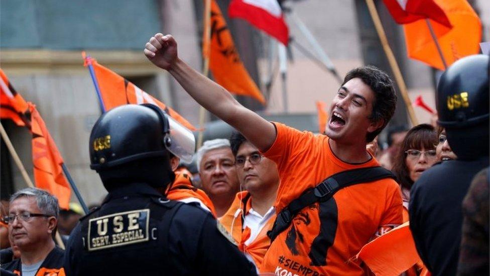 Supporters of Peruvian presidential candidate Keiko Fujimori shouts slogans outside Peru"s National Office of Electoral Processes (ONPE) in Lima, Peru, June 7, 2016