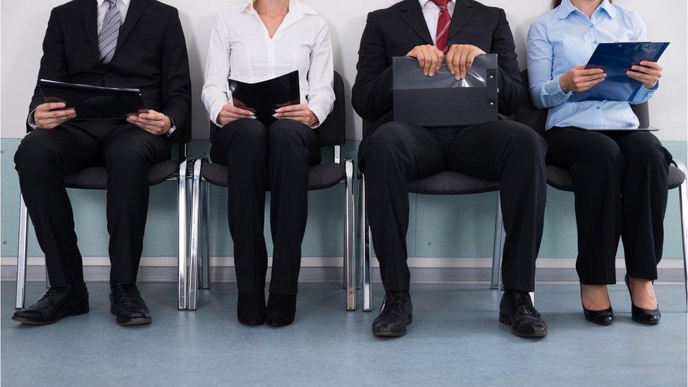 Workers on chairs