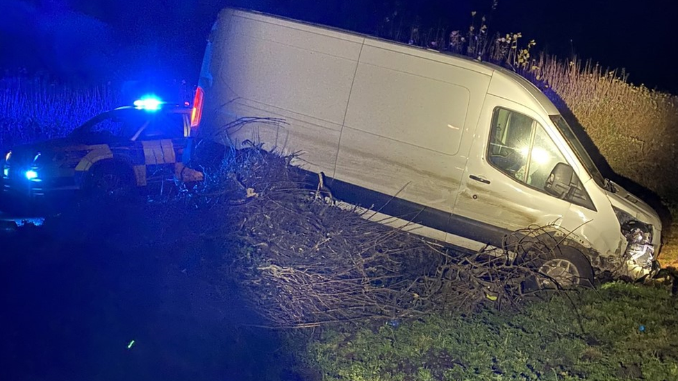 A van in a ditch