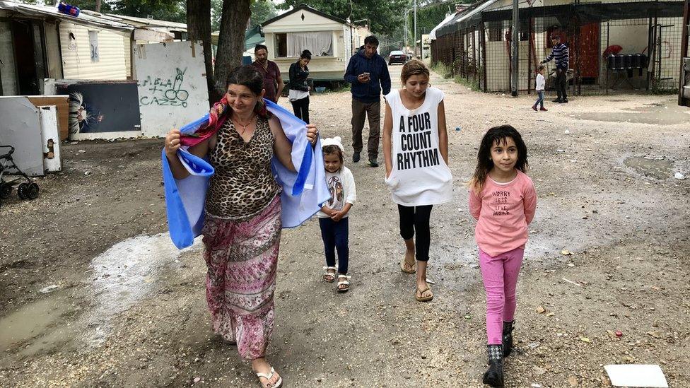 Roma people who live in River village, an illegal camp on the outskirts of Rome