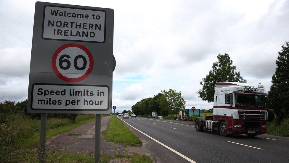 A sign at the Irish border that reads: 'Welcome to Northern Ireland - Speed limits in miles per hour'