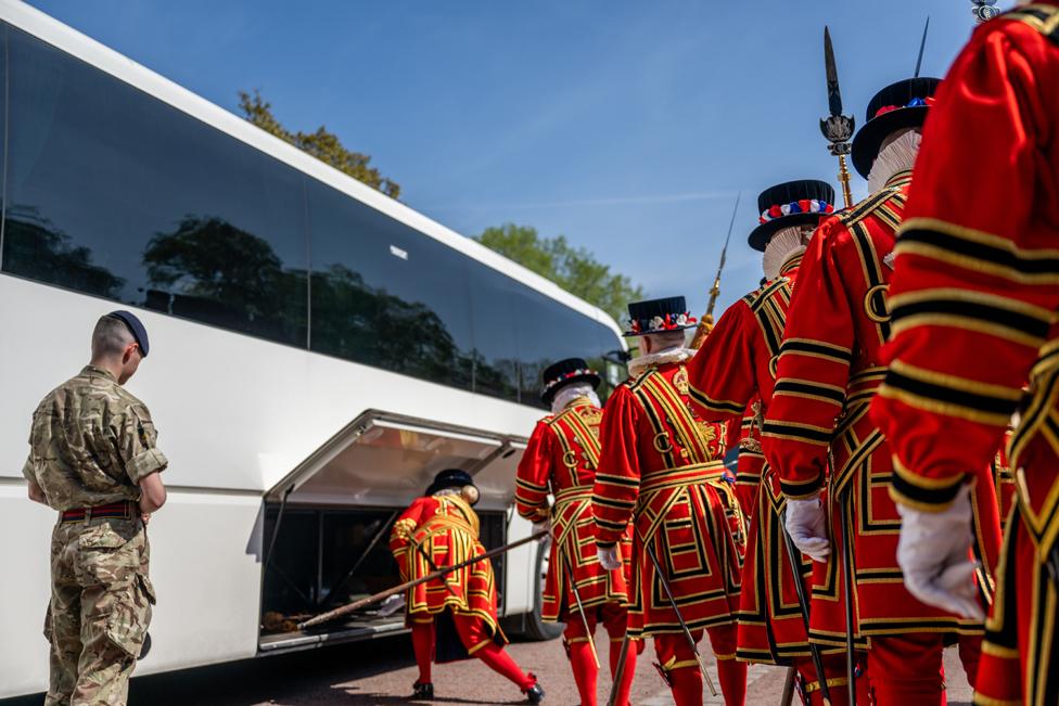 Yeoman of the Guard prepare to board a coach in London.