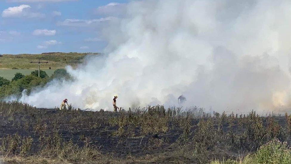 Firefighters tackling field fire near to Rushton, Northamptonshire