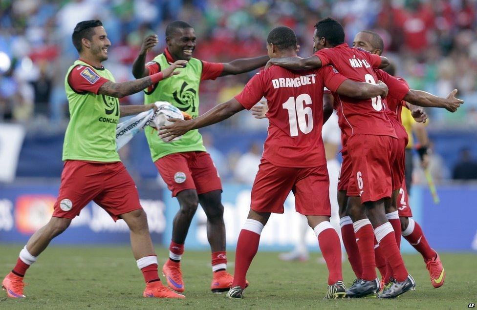 Cuban players hugging