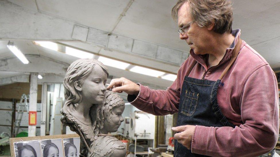 Andrew Sinclair working on a sculpture in his studio.