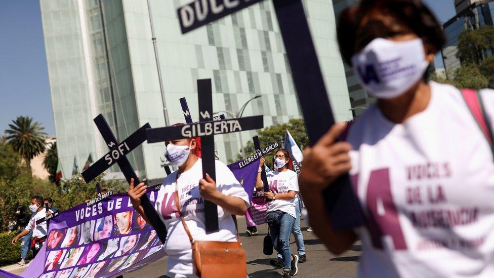 Relatives and friends of victims of femicide hold a march in Mexico City