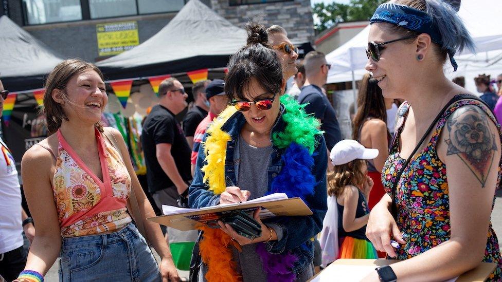 Volunteers gather signatures