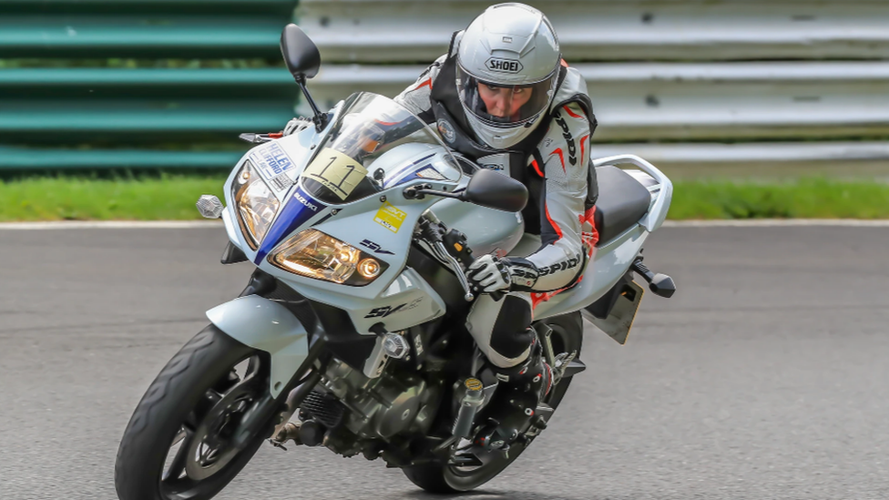 Claire Lomas riding her bike around a track