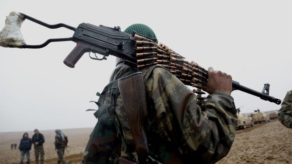 Kurdish fighter near Raqqa