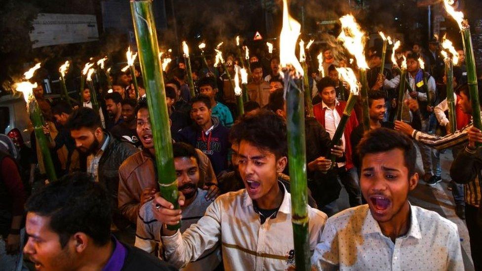 Activists of All Assam Students Union (AASU) along with 30 indigenous organizations take out a torch light procession to protest against the Citizenship Amendment bill in Guwahati on January 31, 2019