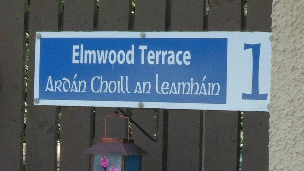 An unofficial sign in Lurgan shows a street name in English and Irish