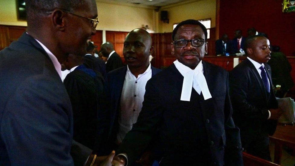 Lead counsel in the defence team of embattled Deputy Chief Justice Philomena Mwilu, James Orengo (R), reacts on May 31, 2019, in Nairobi, following a determination by the court not to prosecute Mwilu over corruption charges