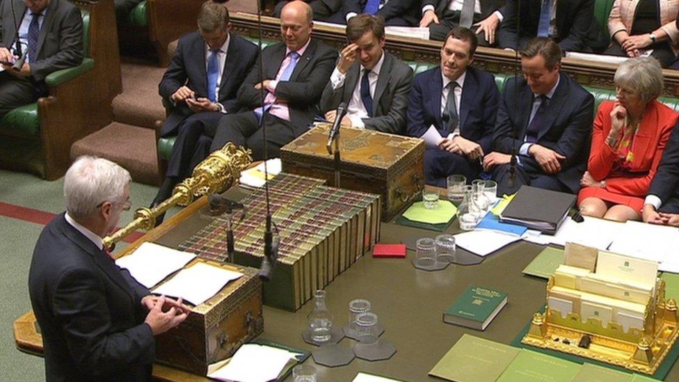 The Little Red Book lies on the despatch box table