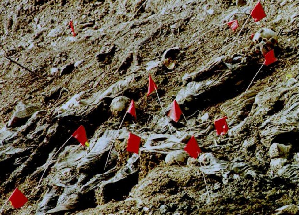 File photo shows mass grave discovered in Srebrenica