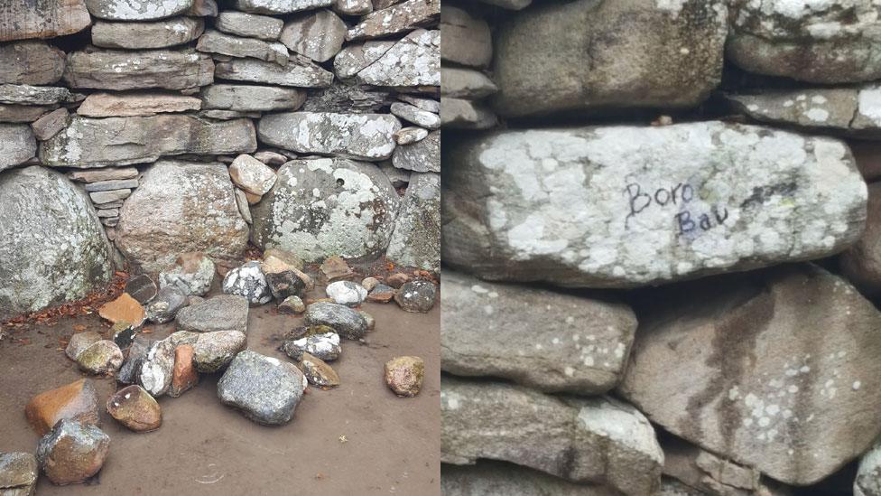 Graffiti air a dhèanamh air Càrn Chlàbhalaig