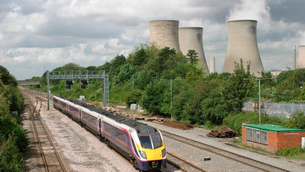 Train approaching train station in Didcot