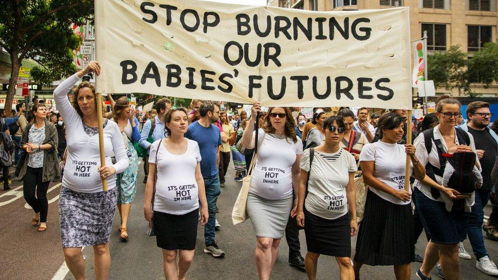 Pregnant women march during a rally for climate action at Sydney Town Hall on 11 December, 2019, in Sydney, Australia